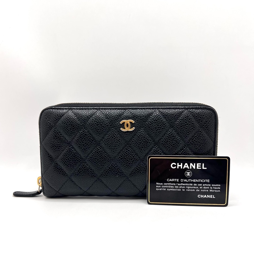 CHANEL Black Quilted Zip-Around Wallet with Gold Logo